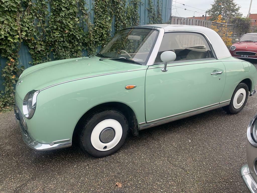 nissan figaro emerald green